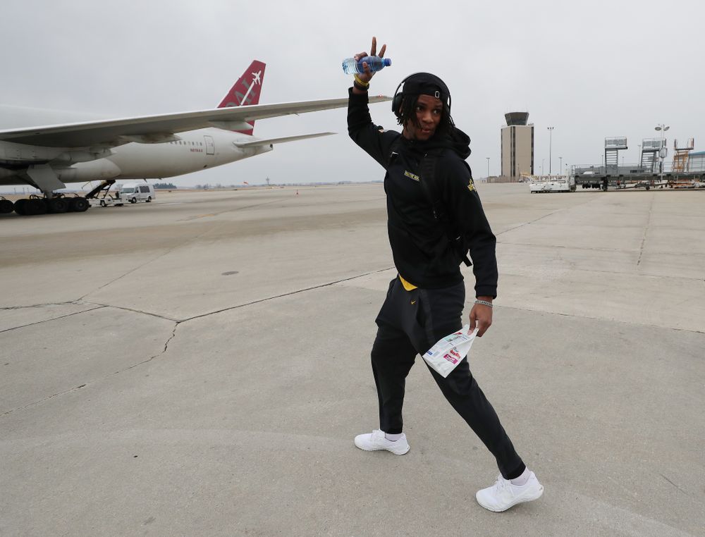 Iowa Hawkeyes wide receiver Ihmir Smith-Marsette (6) boards the team plane Wednesday, December 26, 2018 as they travel to Tampa, Florida for the Outback Bowl. (Brian Ray/hawkeyesports.com)