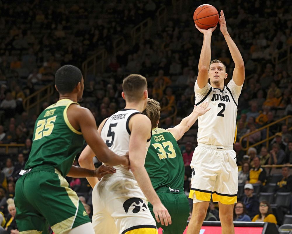 Iowa Hawkeyes forward Jack Nunge (2) puts up a shot during the first half of their game at Carver-Hawkeye Arena in Iowa City on Sunday, Nov 24, 2019. (Stephen Mally/hawkeyesports.com)