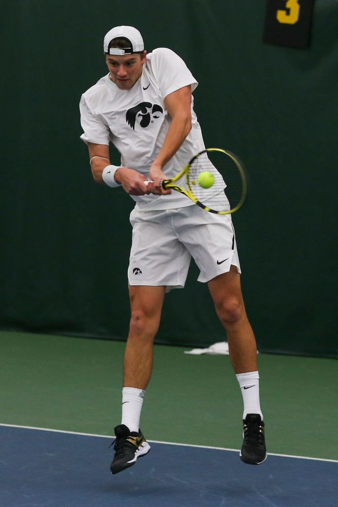 Iowa’s Joe Tyler hits a backhand during the Iowa men’s tennis match vs Western Michigan on Saturday, January 18, 2020 at the Hawkeye Tennis and Recreation Complex. (Lily Smith/hawkeyesports.com)