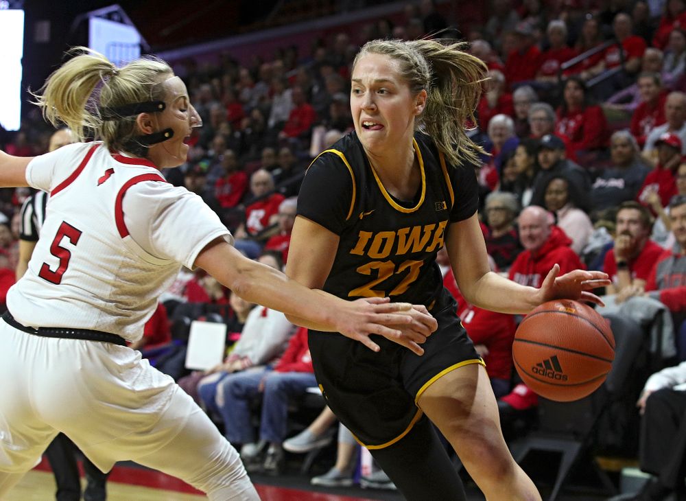 Iowa guard Kathleen Doyle (22) drives with the ball during the first quarter of their game at the Rutgers Athletic Center in Piscataway, N.J. on Sunday, March 1, 2020. (Stephen Mally/hawkeyesports.com)