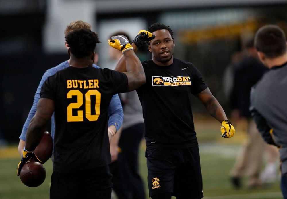 Iowa Hawkeyes running back Akrum Wadley (25) and running back James Butler (20) during the team's annual pro day Monday, March 26, 2018 at the Hansen Football Performance Center. (Brian Ray/hawkeyesports.com)