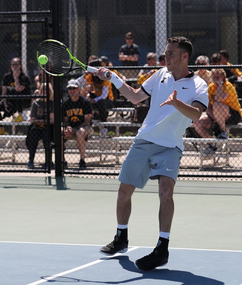 IowaÕs Kareem Allaf and Jonas Larsen play a doubles match against the Michigan Wolverines Sunday, April 21, 2019 at the Hawkeye Tennis and Recreation Complex. (Brian Ray/hawkeyesports.com)