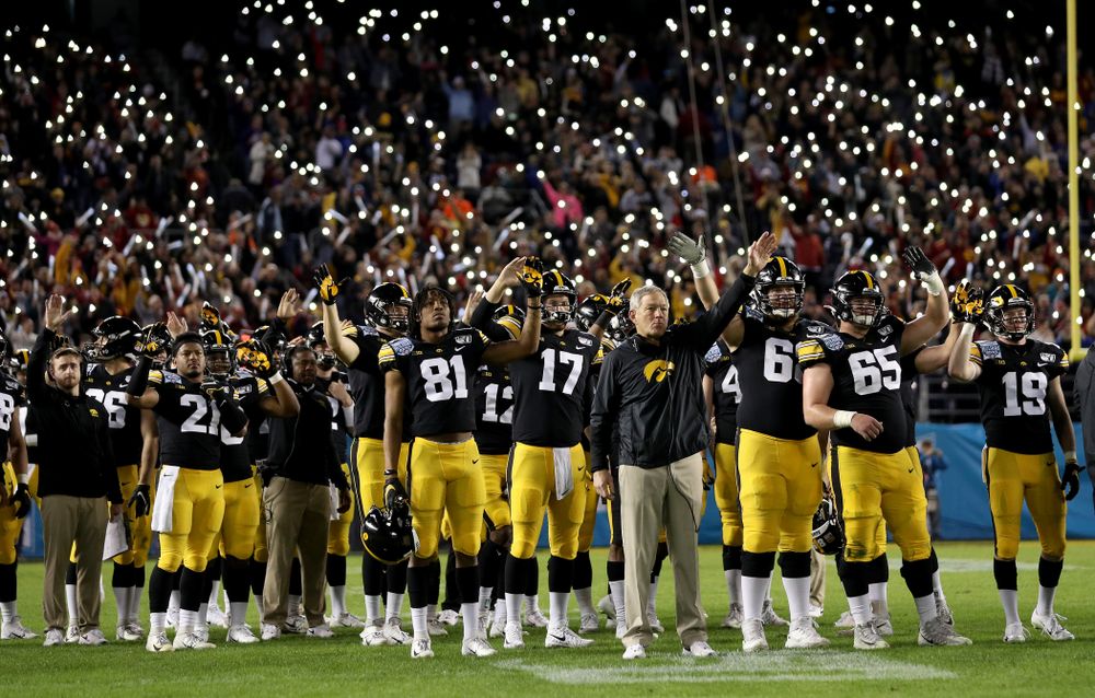 The Iowa Hawkeyes wave to the Stead Family ChildrenÕs Hospital at the end of the first quarter against USC in the Holiday Bowl Friday, December 27, 2019 at San Diego Community Credit Union Stadium.  (Brian Ray/hawkeyesports.com)