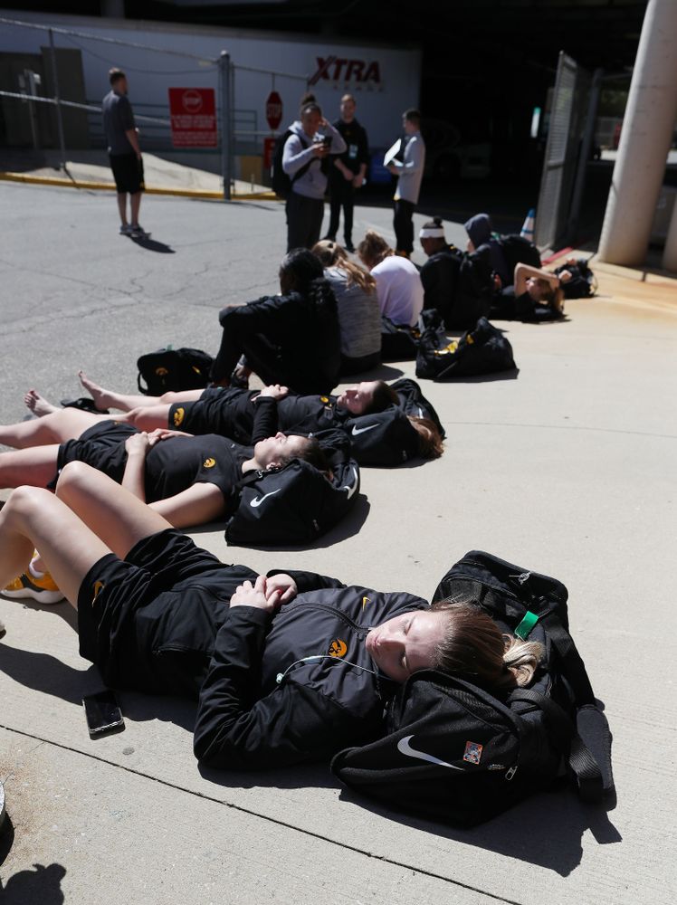 The Iowa Hawkeyes lay in the sun following practice and media before the regional final of the 2019 NCAA Women's College Basketball Tournament against the Baylor Bears Sunday, March 31, 2019 at Greensboro Coliseum in Greensboro, NC.(Brian Ray/hawkeyesports.com)