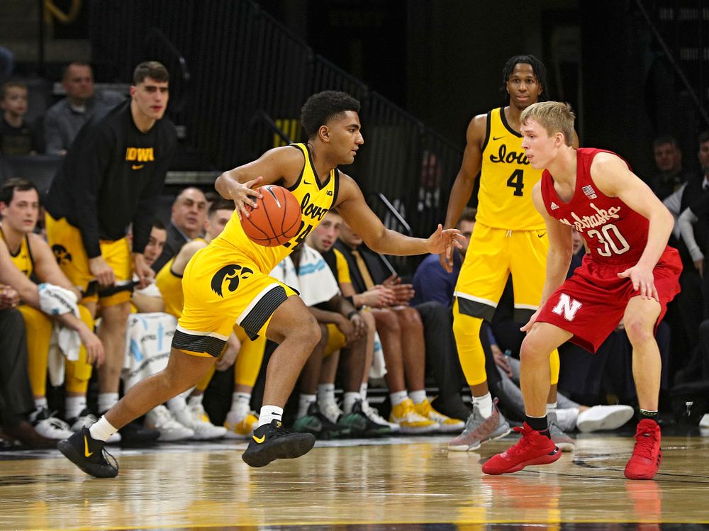 Iowa Hawkeyes guard Nicolas Hobbs (24) drives with the ball during the second half of their game at Carver-Hawkeye Arena in Iowa City on Saturday, February 8, 2020. (Stephen Mally/hawkeyesports.com)