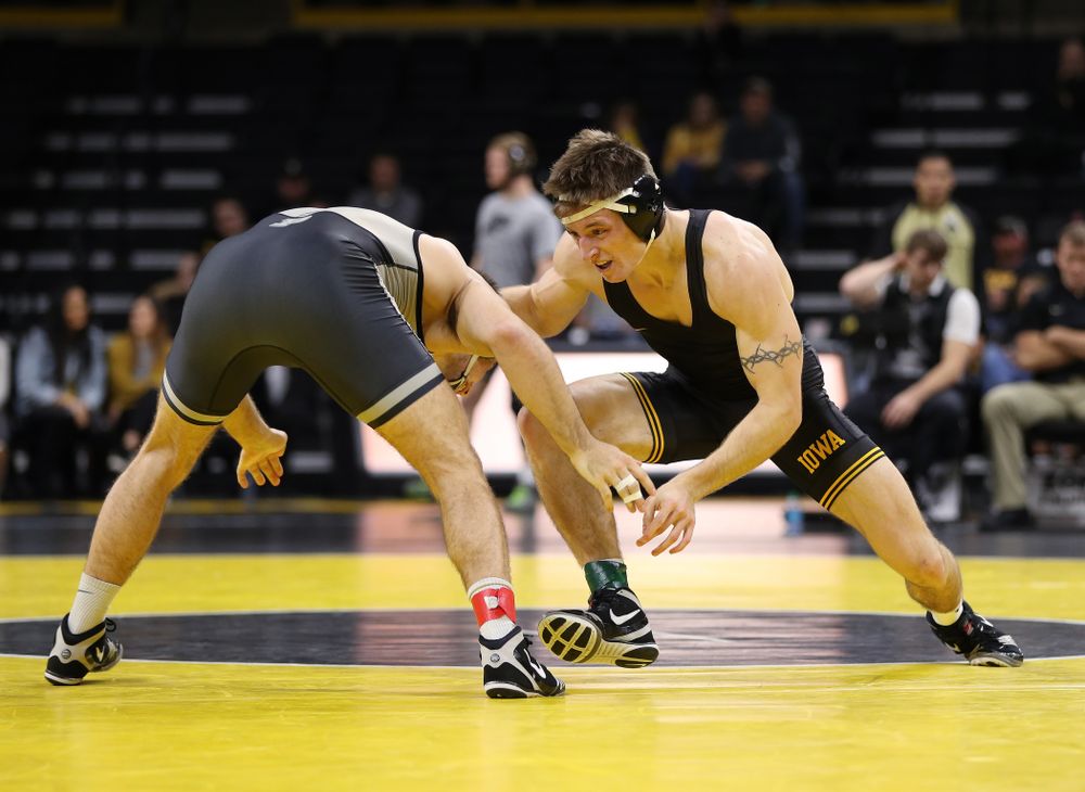 Iowa's Myles Wilson wrestles Purdue's Dylan Lydy at 174 pounds Saturday, November 24, 2018 at Carver-Hawkeye Arena. (Brian Ray/hawkeyesports.com)