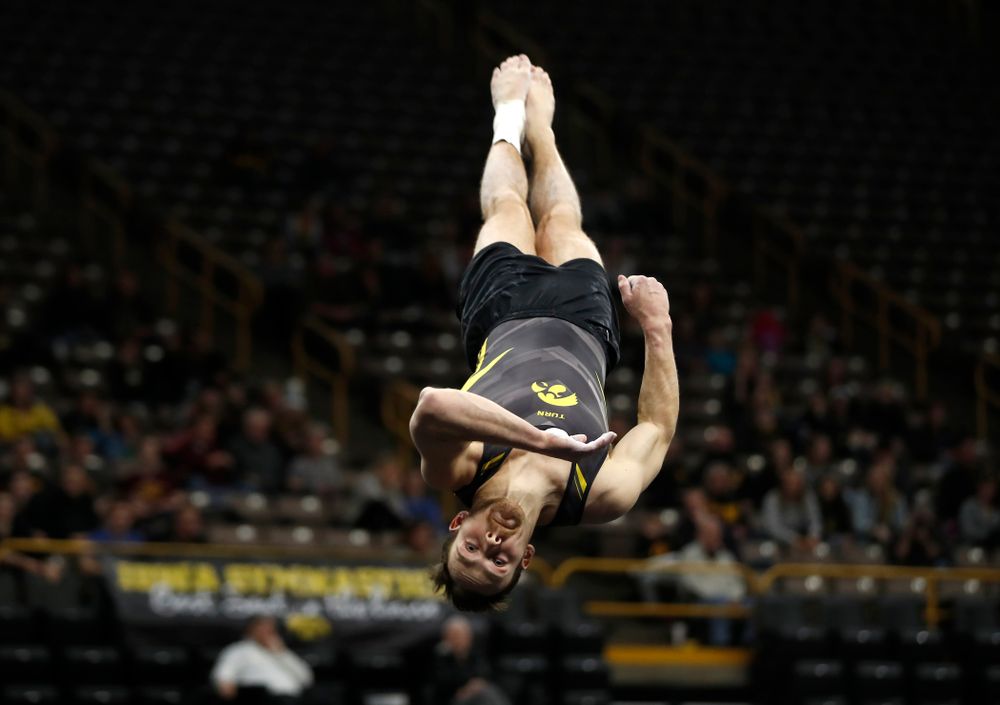 Dylan Ellsworth competes on the floor against Minnesota and Air Force 