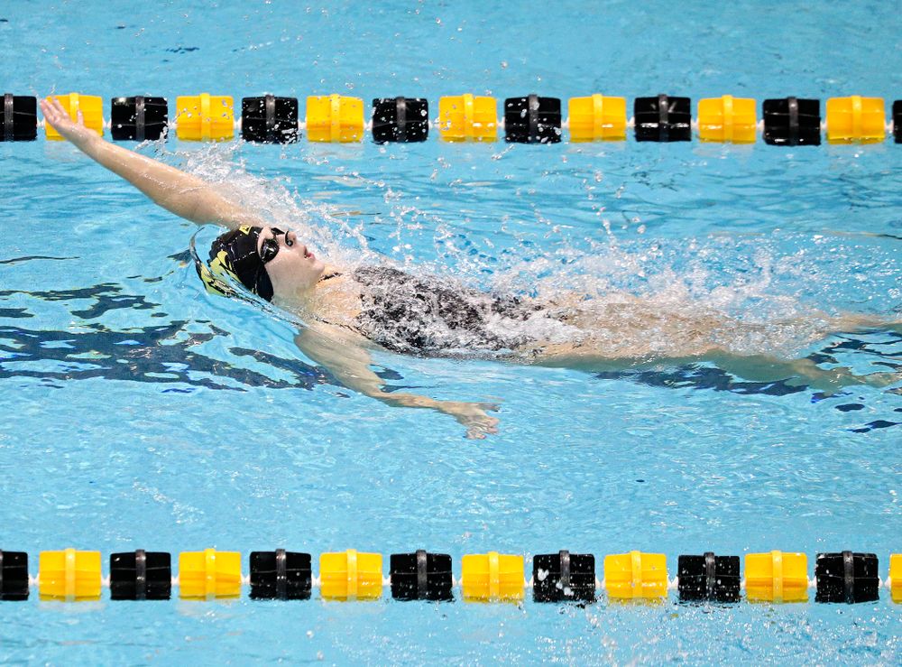 Iowa’s Zoe Pawloski swims the women’s 100-yard backstroke event during their meet against Michigan State and Northern Iowa at the Campus Recreation and Wellness Center in Iowa City on Friday, Oct 4, 2019. (Stephen Mally/hawkeyesports.com)