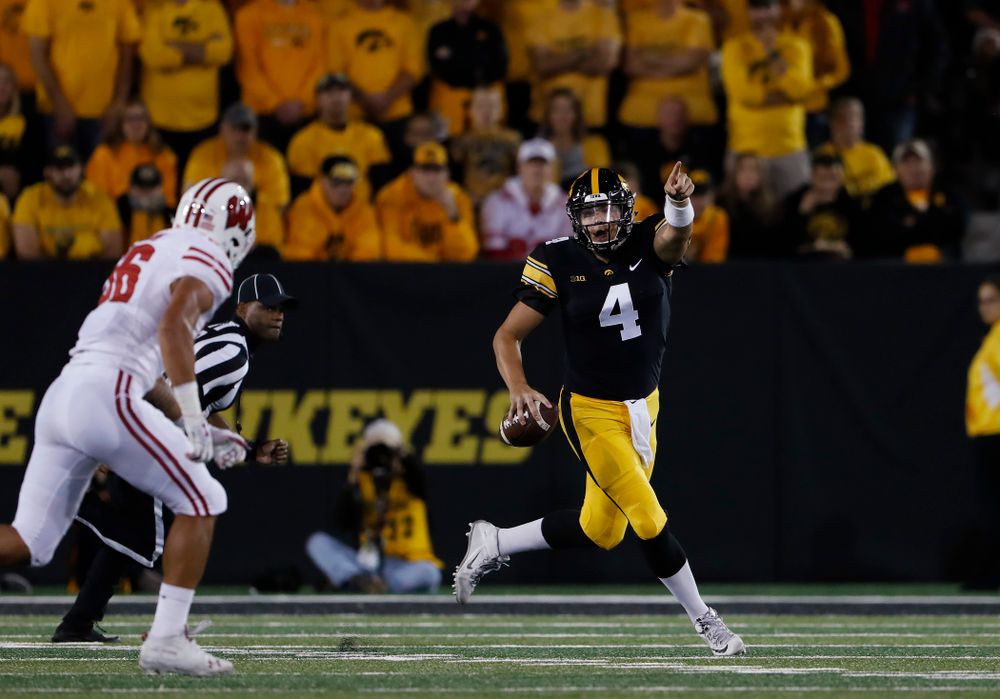 Iowa Hawkeyes quarterback Nate Stanley (4) points down the field against the Wisconsin Badgers Saturday, September 22, 2018 at Kinnick Stadium. (Brian Ray/hawkeyesports.com)