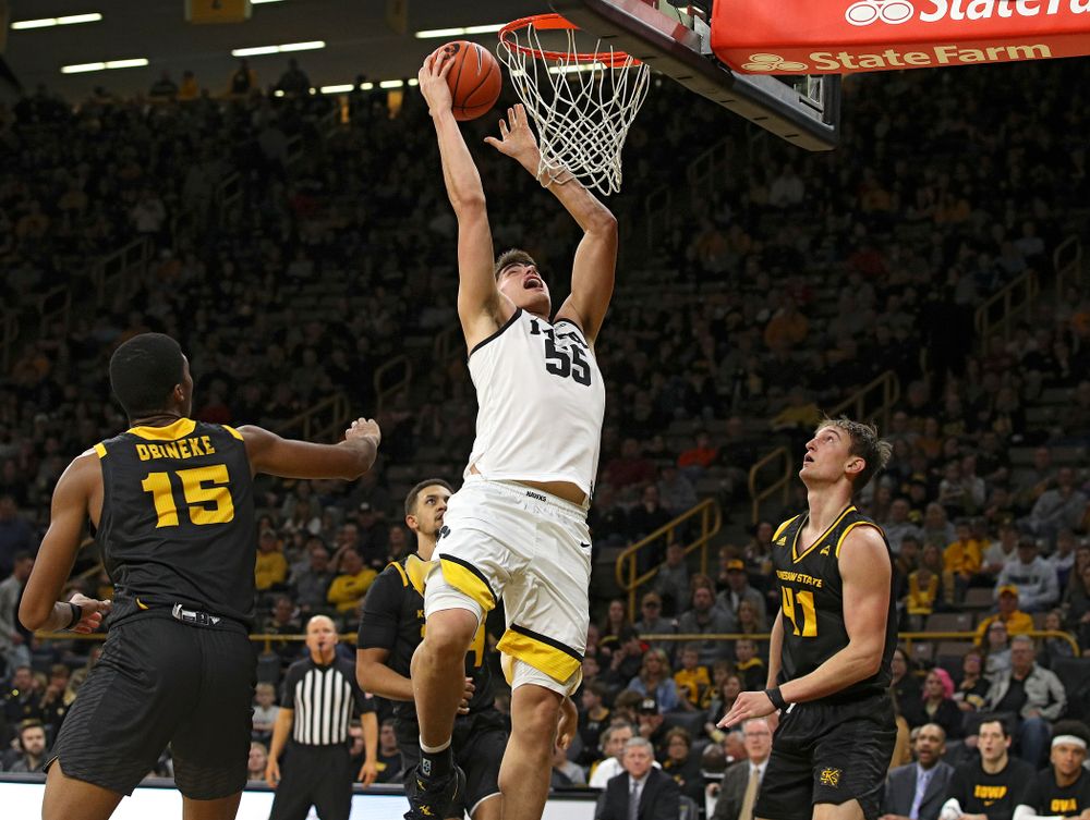 Iowa Hawkeyes center Luka Garza (55) makes a basket during the second half of their their game at Carver-Hawkeye Arena in Iowa City on Sunday, December 29, 2019. (Stephen Mally/hawkeyesports.com)