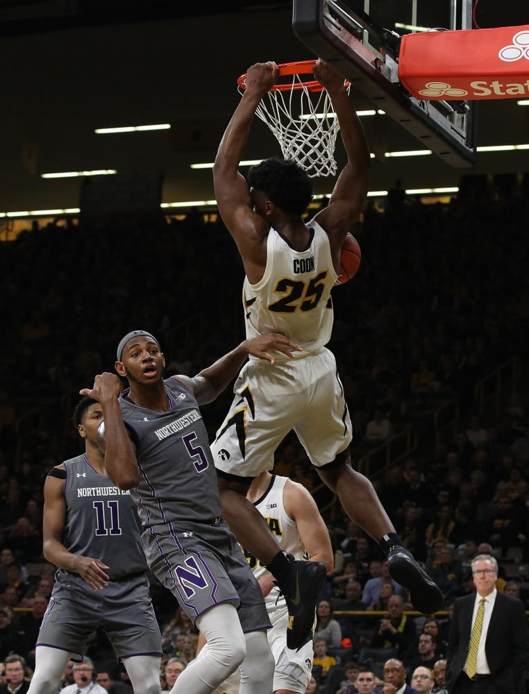 Iowa Hawkeyes forward Tyler Cook (25) gets the dunk and foul against the Northwestern Wildcats Sunday, February 10, 2019 at Carver-Hawkeye Arena. (Brian Ray/hawkeyesports.com)