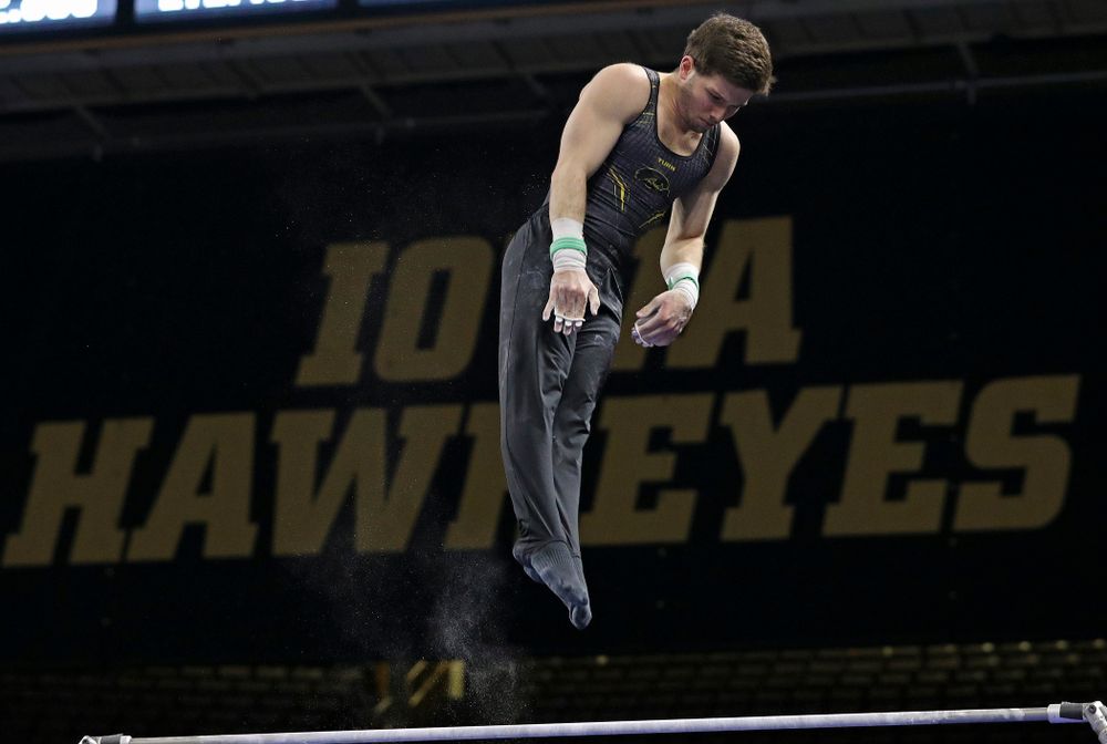 Iowa's Rogelio Vazquez competes in the horizontal bar during the first day of the Big Ten Men's Gymnastics Championships at Carver-Hawkeye Arena in Iowa City on Friday, Apr. 5, 2019. (Stephen Mally/hawkeyesports.com)