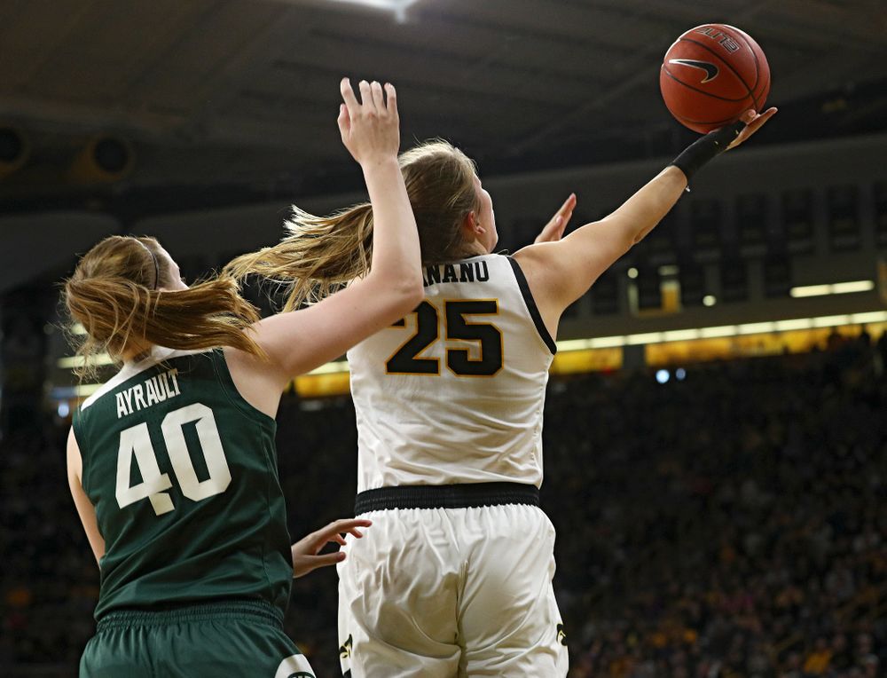 Iowa Hawkeyes forward Monika Czinano (25) scores a basket during the first quarter of their game at Carver-Hawkeye Arena in Iowa City on Sunday, January 26, 2020. (Stephen Mally/hawkeyesports.com)