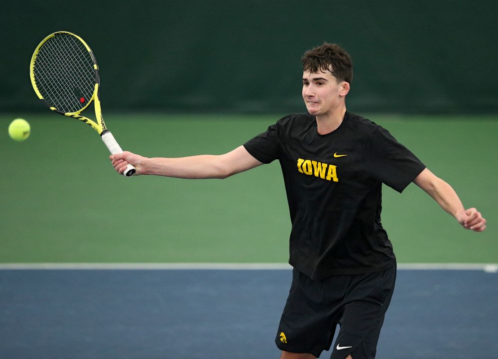 Iowa’s Matt Clegg returns a shot during his doubles match at the Hawkeye Tennis and Recreation Complex in Iowa City on Friday, March 6, 2020. (Stephen Mally/hawkeyesports.com)