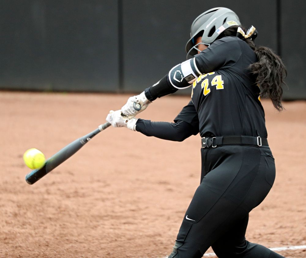 Iowa DoniRae Mayhew (24) hits a 2-run home run during the fourth inning of their game against Iowa Softball vs Indian Hills Community College at Pearl Field in Iowa City on Sunday, Oct 6, 2019. (Stephen Mally/hawkeyesports.com)