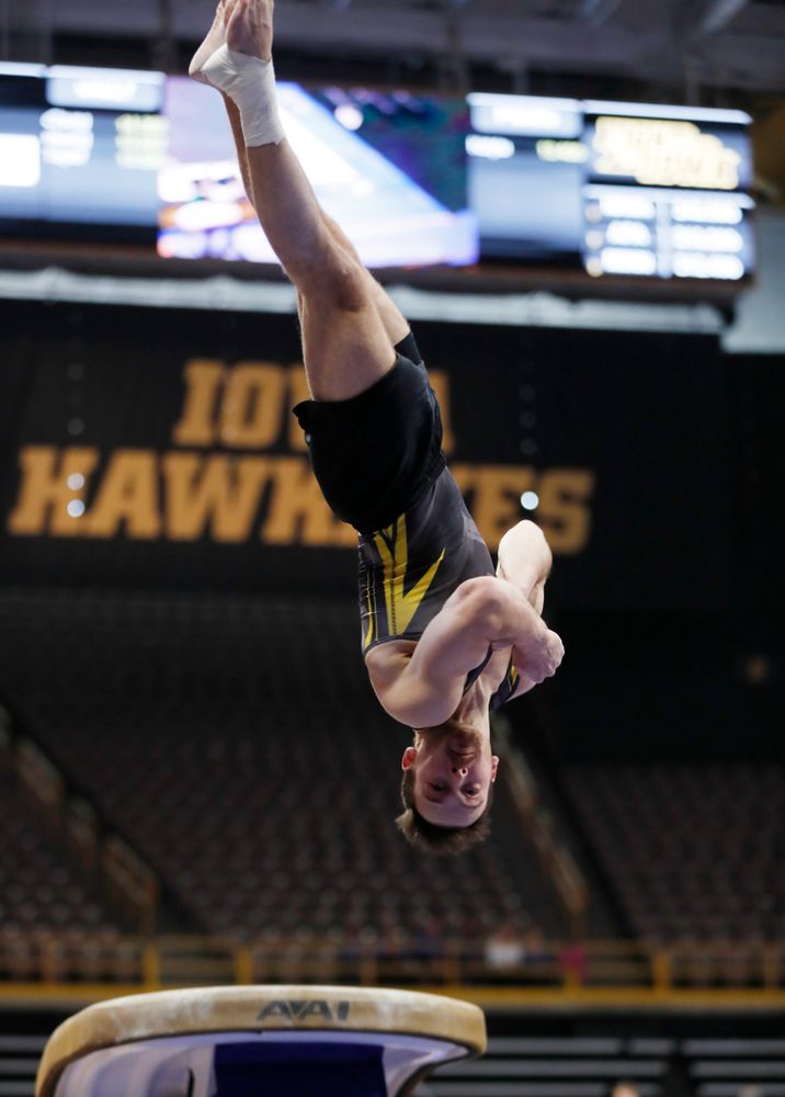 Dylan Ellsworth competes on the vault against Minnesota and Air Force 