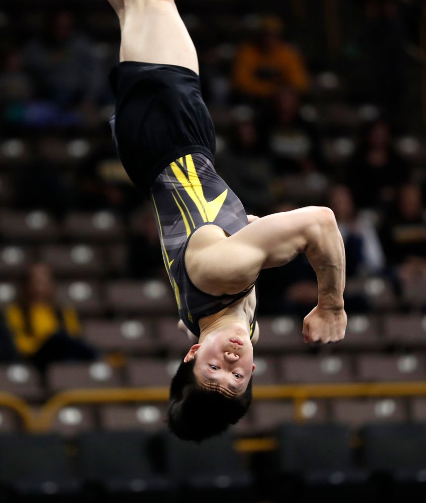 Bennet Huang competes on the floor against Minnesota and Air Force 