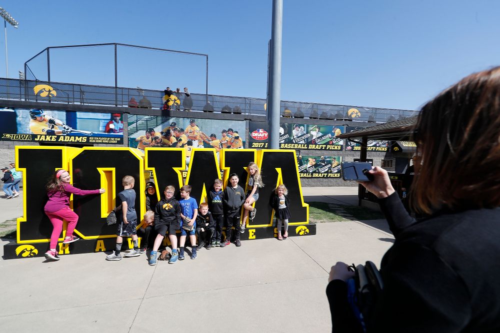 Fans take photos before the Iowa Hawkeyes game against the Michigan Wolverines Sunday, April 29, 2018 at Duane Banks Field. (Brian Ray/hawkeyesports.com)