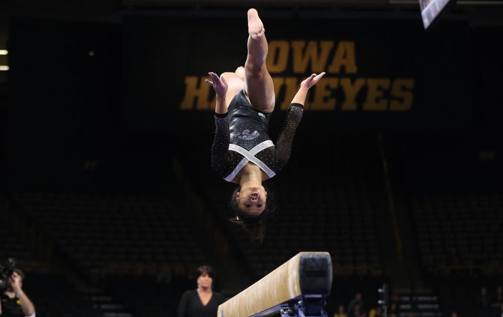Iowa's Misty-Jade Carlson competes on the beam against the Rutgers Scarlet Knights Saturday, January 26, 2019 at Carver-Hawkeye Arena. (Brian Ray/hawkeyesports.com)