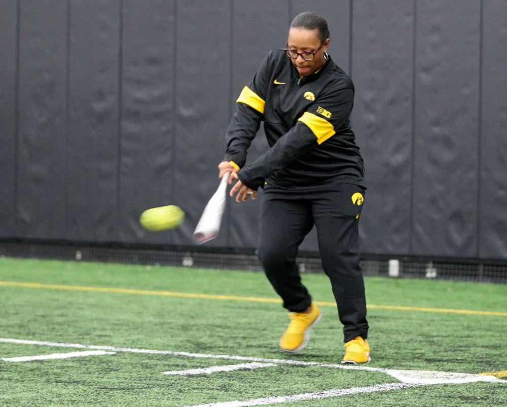 Iowa assistant coach Trena Prater hits a ball during practice at Iowa Softball Media Day at the Hawkeye Tennis and Recreation Complex in Iowa City on Thursday, January 30, 2020. (Stephen Mally/hawkeyesports.com)