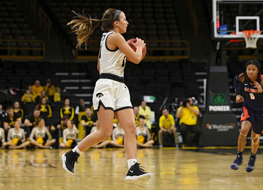 Iowa Hawkeyes guard Megan Meyer (11) pulls in a pass during the fourth quarter of their game at Carver-Hawkeye Arena in Iowa City on Tuesday, December 31, 2019. (Stephen Mally/hawkeyesports.com)