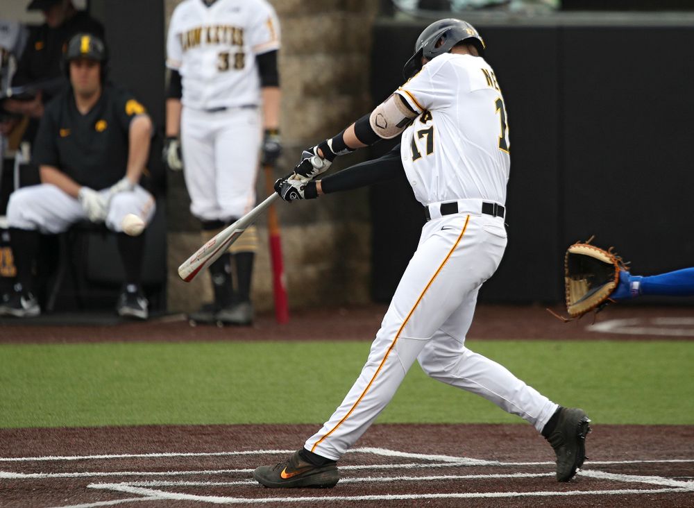 Iowa shortstop Dylan Nedved (17) hits an RBI double during the fourth inning of their college baseball game at Duane Banks Field in Iowa City on Wednesday, March 11, 2020. (Stephen Mally/hawkeyesports.com)