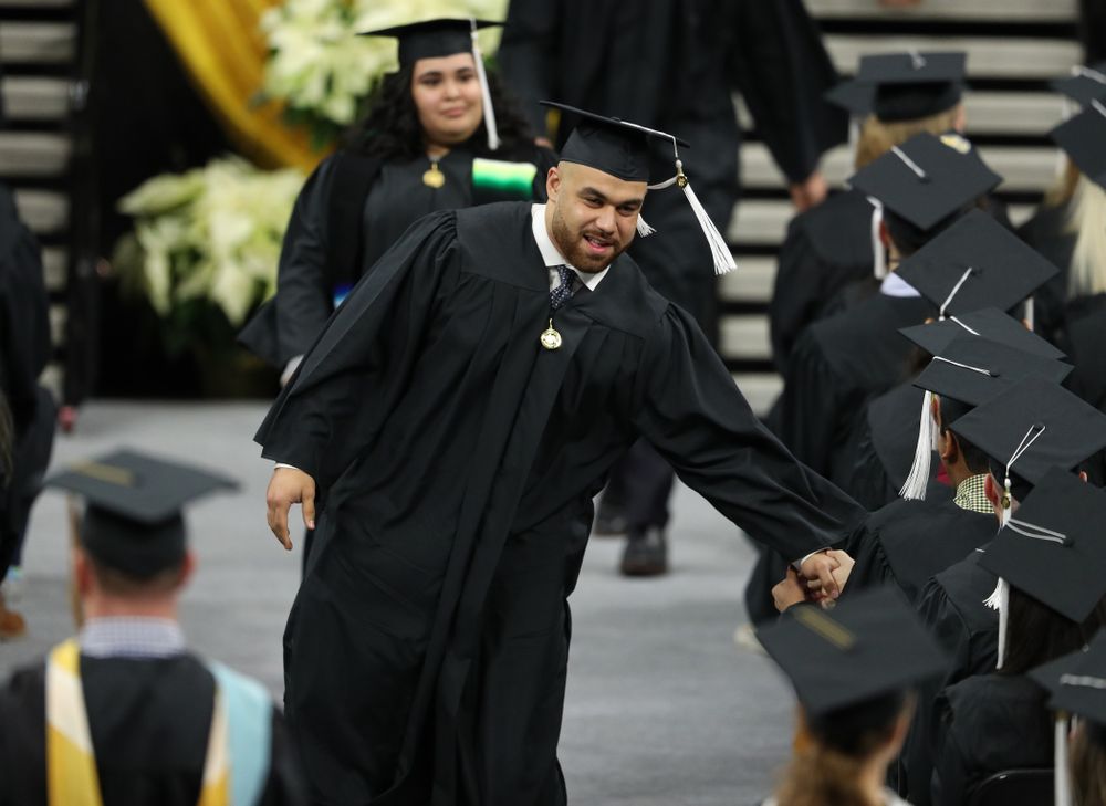 Iowa Football's Austin Kelly during the Fall Commencement Ceremony  Saturday, December 15, 2018 at Carver-Hawkeye Arena. (Brian Ray/hawkeyesports.com)