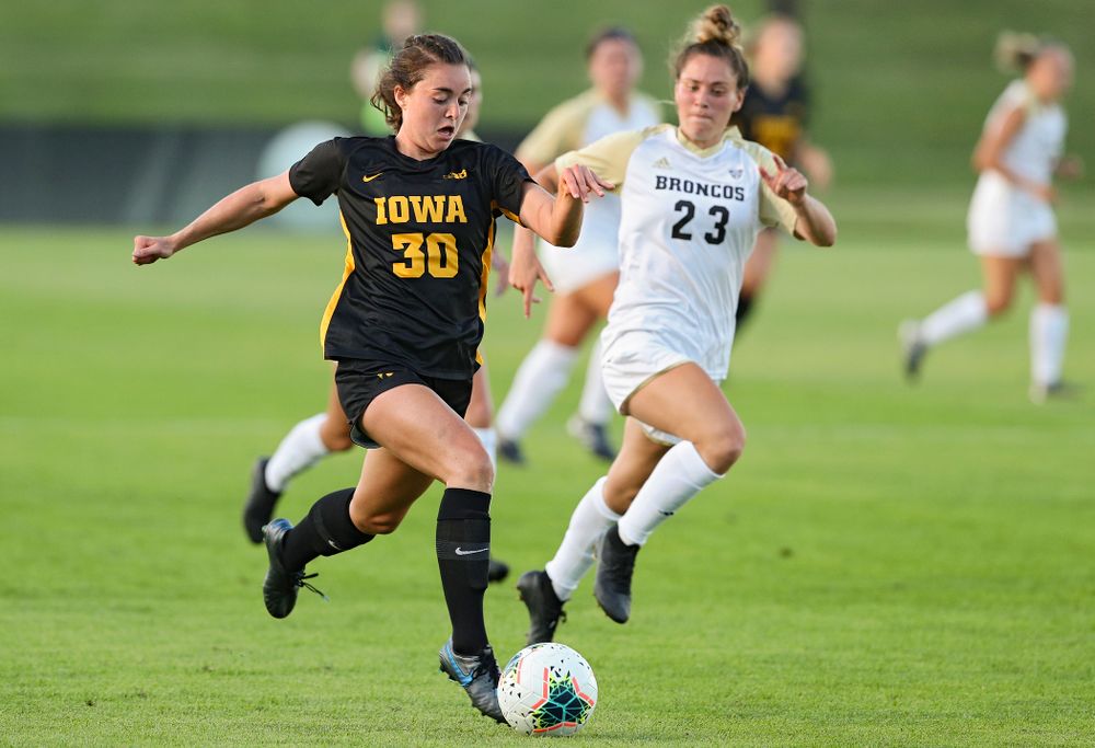 Iowa forward Devin Burns (30) chases down the ball during the first half of their match against Western Michigan at the Iowa Soccer Complex in Iowa City on Thursday, Aug 22, 2019. (Stephen Mally/hawkeyesports.com)