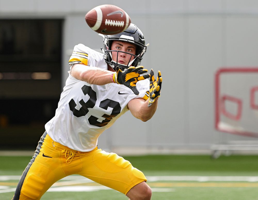 Iowa Hawkeyes defensive back Riley Moss (33) pulls in a pass during Fall Camp Practice No. 10 at the Hansen Football Performance Center in Iowa City on Tuesday, Aug 13, 2019. (Stephen Mally/hawkeyesports.com)