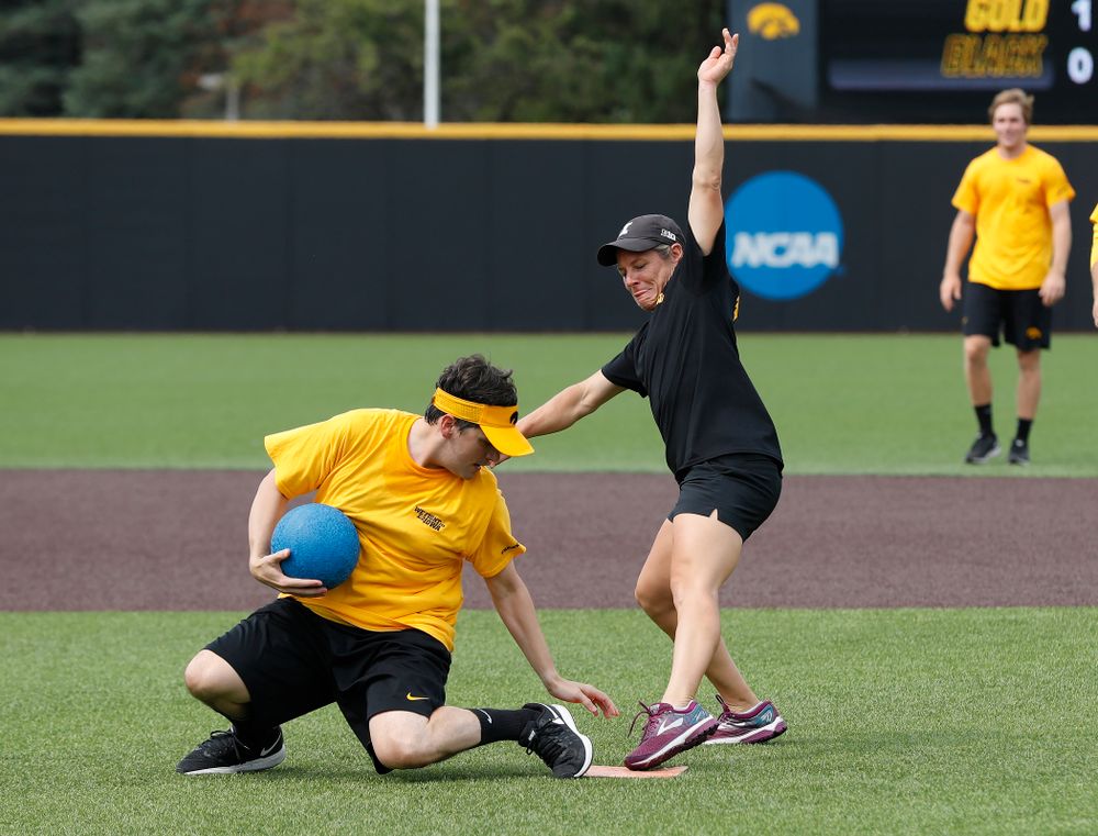 Head Women's Golf Coach Megan Menzel and Asst. Director Compliance Henry Archuleta during the Iowa Student Athlete Kickoff Kickball game  Sunday, August 19, 2018 at Duane Banks Field. (Brian Ray/hawkeyesports.com)
