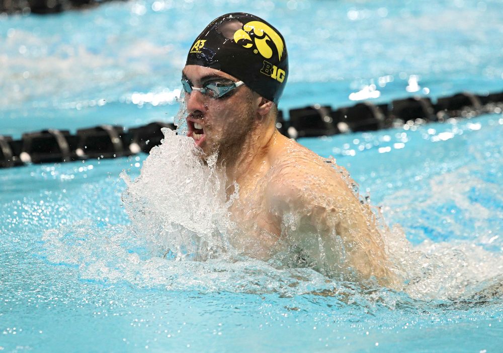 Iowa’s Weston Credit swims the men’s 100-yard breaststroke event during their meet against Michigan State and Northern Iowa at the Campus Recreation and Wellness Center in Iowa City on Friday, Oct 4, 2019. (Stephen Mally/hawkeyesports.com)