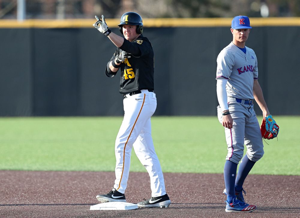 Iowa first baseman Peyton Williams (45) celebrates after hitting a double during the third inning of their college baseball game at Duane Banks Field in Iowa City on Tuesday, March 10, 2020. (Stephen Mally/hawkeyesports.com)