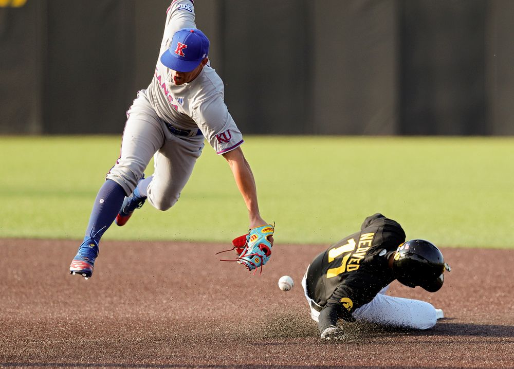Iowa shortstop Dylan Nedved (17) steals second base during the third inning of their college baseball game at Duane Banks Field in Iowa City on Tuesday, March 10, 2020. (Stephen Mally/hawkeyesports.com)