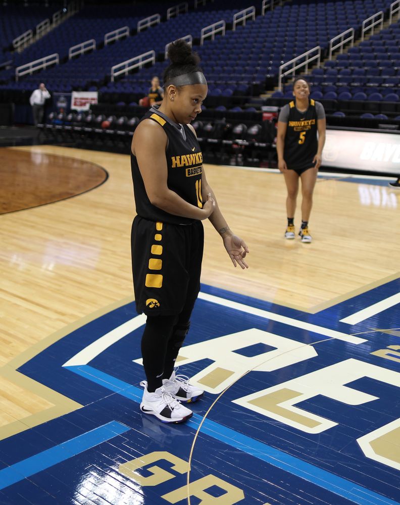 Iowa Hawkeyes guard Tania Davis (11) celebrates after sinking a half court shot during shoot around before their regional final against the Baylor Lady Bears in the 2019 NCAA Women's College Basketball Tournament Monday, April 1, 2019 at Greensboro Coliseum in Greensboro, NC.(Brian Ray/hawkeyesports.com)