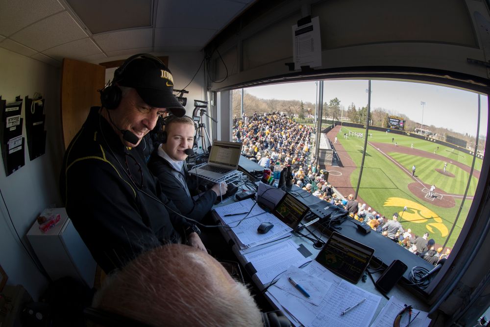 Henry B. and Patricia B. Tippie Director of Athletics Chair Gary Barta talks on the radio as the Iowa Hawkeyes face off against Michigan Saturday, April 28, 2018 at Duane Banks Field (Brian Ray/hawkeyesports.com)