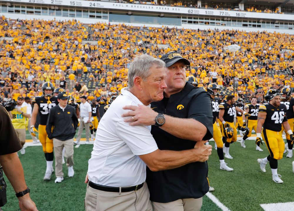 Iowa Hawkeyes head coach Kirk Ferentz shakes hands with head strength coach Chris Doyle following their game against the Northern Illinois Huskies Saturday, September 1, 2018 at Kinnick Stadium. (Brian Ray/hawkeyesports.com)