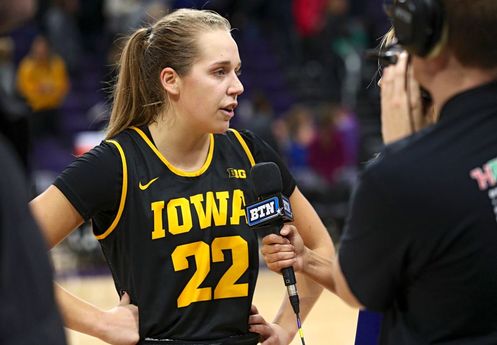 Iowa Hawkeyes guard Kathleen Doyle (22) is interviewed after winning their game at Welsh-Ryan Arena in Evanston, Ill. on Sunday, January 5, 2020. (Stephen Mally/hawkeyesports.com)