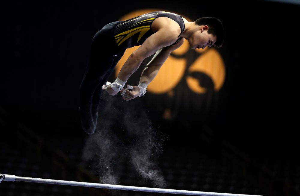 Addison Chung competes on the high bar against Minnesota and Air Force 
