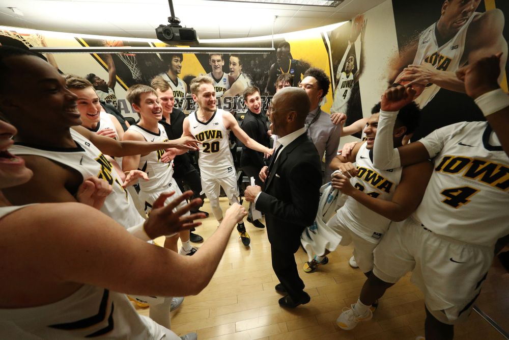 Iowa Hawkeyes assistant coach Sherman Dillard dances in the locker room following their victory over the Michigan Wolverines  Friday, February 1, 2019 at Carver-Hawkeye Arena. (Brian Ray/hawkeyesports.com)