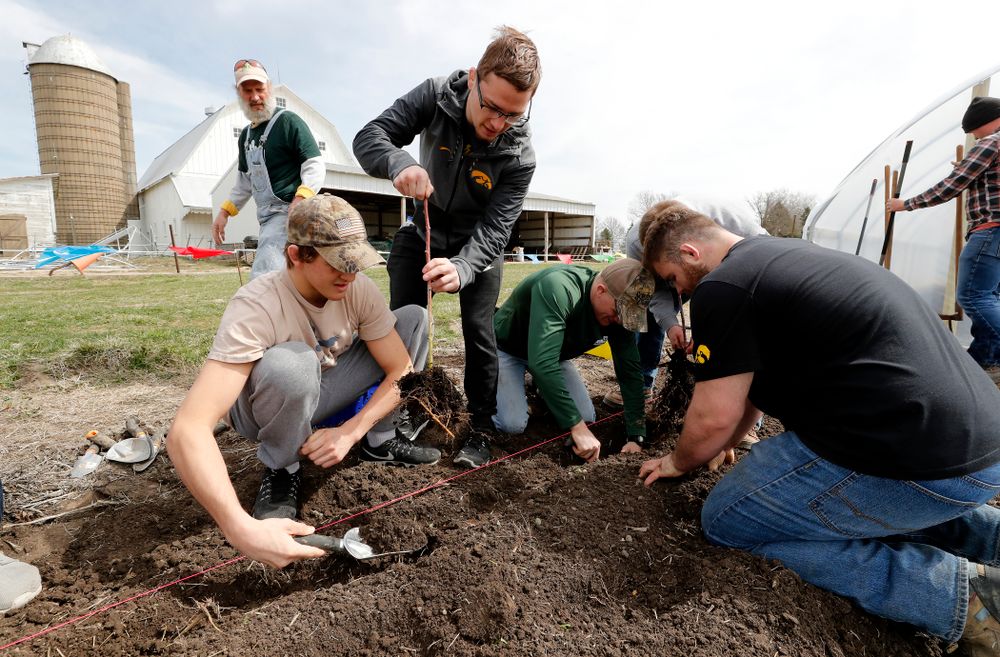 Members of the Iowa Wrestling Team  volunteer during the Iowa Athletics Department's annual Day of Caring Sunday, April 22, 2018. (Brian Ray/hawkeyesports.com)