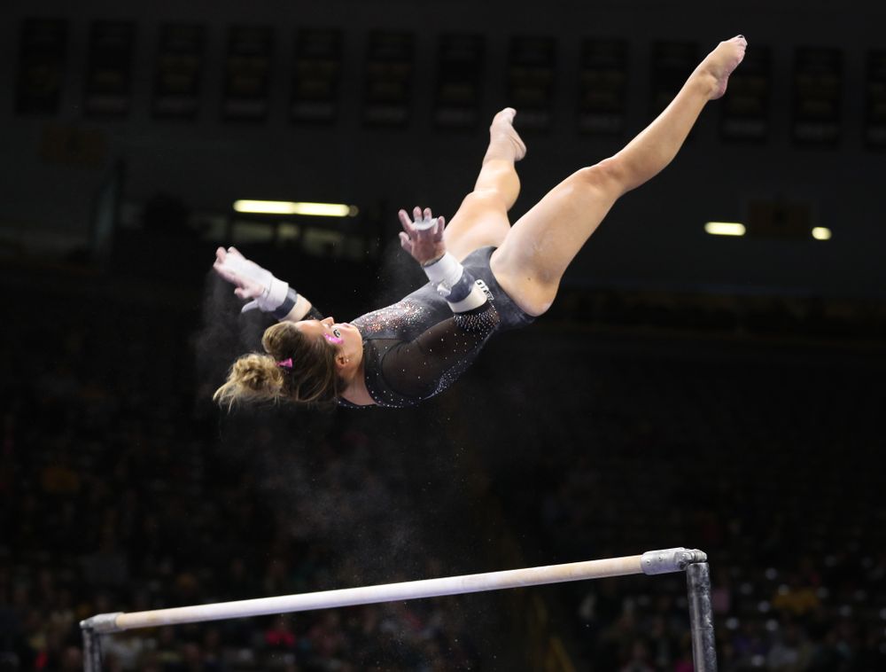 Iowa's Maddie Kampschroeder competes on the bars during their meet against the Minnesota Golden Gophers Saturday, January 19, 2019 at Carver-Hawkeye Arena. (Brian Ray/hawkeyesports.com)