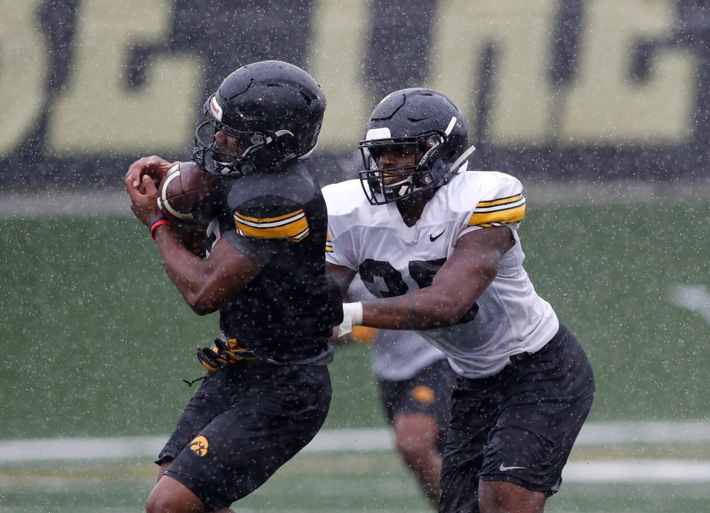Iowa Hawkeyes wide receiver Tyrone Tracy Jr. (3) and linebacker Barrington Wade (35) during camp practice No. 15  Monday, August 20, 2018 at the Hansen Football Performance Center. (Brian Ray/hawkeyesports.com)