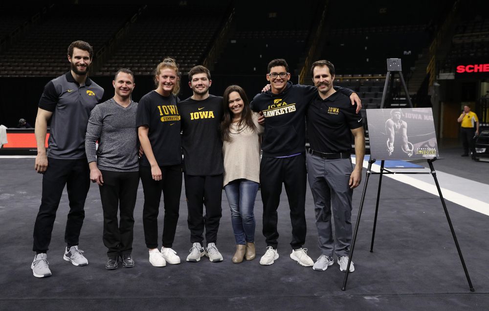Iowa Men's Gymnast Rogelio Vazquez and his family during senior day ceremonies following their meet against the Ohio State Buckeyes  Saturday, March 16, 2019 at Carver-Hawkeye Arena.  (Brian Ray/hawkeyesports.com)