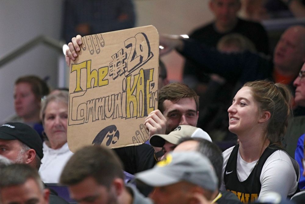 Fans hold up a sign for Iowa Hawkeyes guard Kate Martin during the fourth quarter of their game at Welsh-Ryan Arena in Evanston, Ill. on Sunday, January 5, 2020. (Stephen Mally/hawkeyesports.com)