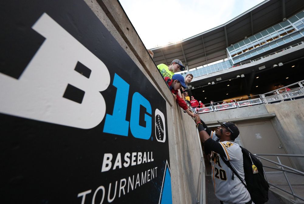 Iowa Hawkeyes Izaya Fullard (20) signs autographs following their game against the Indiana Hoosiers in the first round of the Big Ten Baseball Tournament Wednesday, May 22, 2019 at TD Ameritrade Park in Omaha, Neb. (Brian Ray/hawkeyesports.com)