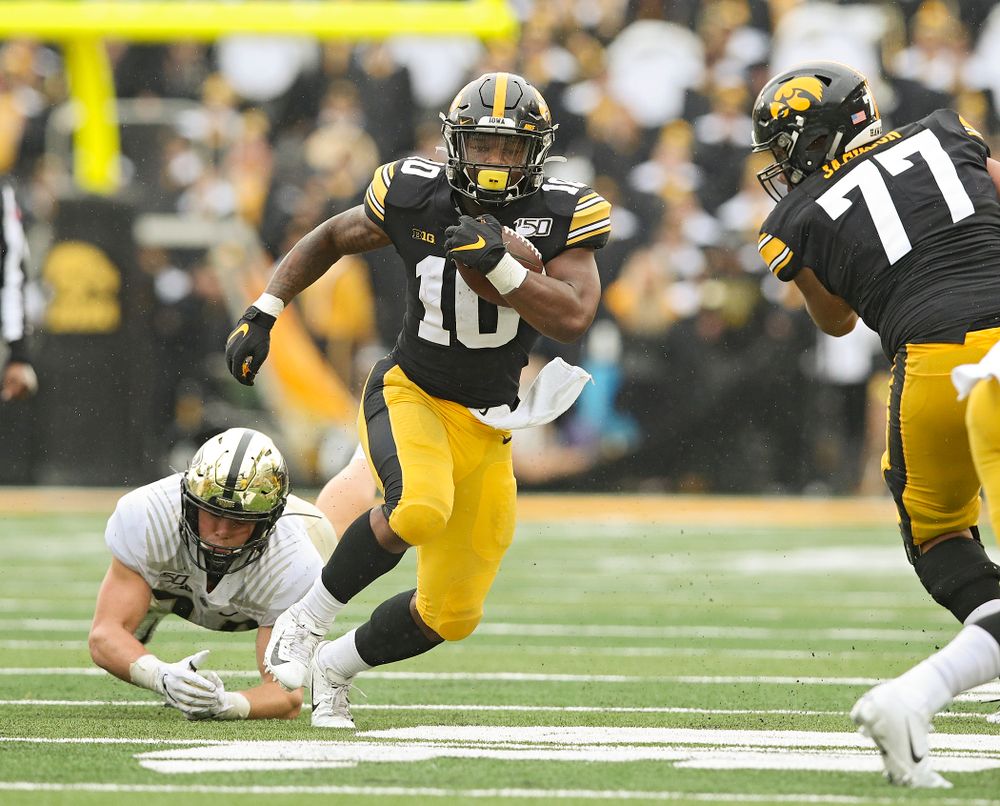 Iowa Hawkeyes running back Mekhi Sargent (10) on a run during the fourth quarter of their game at Kinnick Stadium in Iowa City on Saturday, Oct 19, 2019. (Stephen Mally/hawkeyesports.com)