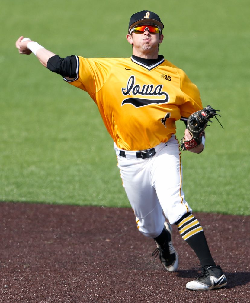 Iowa Hawkeyes infielder Mitchell Boe (4) throws to first base during a game against Evansville at Duane Banks Field on March 18, 2018. (Tork Mason/hawkeyesports.com)