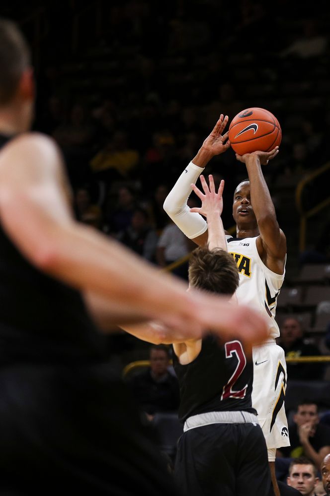 Iowa Hawkeyes guard Maishe Dailey (1) puts up a 3-pointer during a game against Guilford College at Carver-Hawkeye Arena on November 4, 2018. (Tork Mason/hawkeyesports.com)