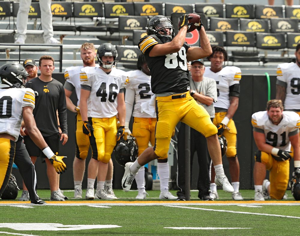 Iowa Hawkeyes wide receiver Nico Ragaini (89) pulls in a pass during Fall Camp Practice No. 8 at Kids Day at Kinnick Stadium in Iowa City on Saturday, Aug 10, 2019. (Stephen Mally/hawkeyesports.com)