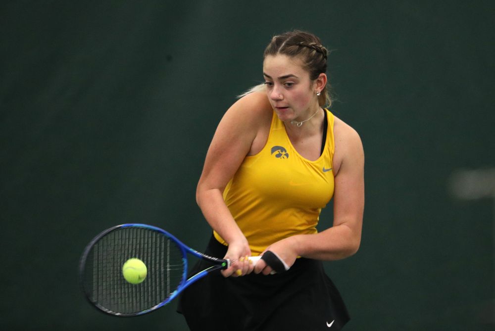 Iowa's Sophie Clark plays a doubles match against Xavier Friday, January 18, 2019 at the Hawkeye Tennis and Recreation Center. (Brian Ray/hawkeyesports.com)